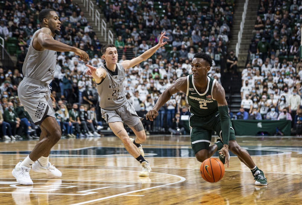 <p>Junior guard Tyson Walker travels down the court in the Spartans&#x27; match against the Western Michigan Broncos at the Breslin Center on Friday, Nov. 12, 2021. </p>