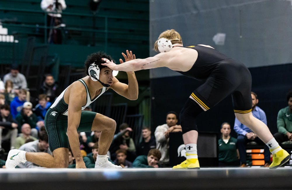 MSU R-Fr. Wt. 157, Darius Marines, gets in position to take on his Iowa opponent in the Jenison Field House in East Lansing, MI on Feb. 8, 2026.
