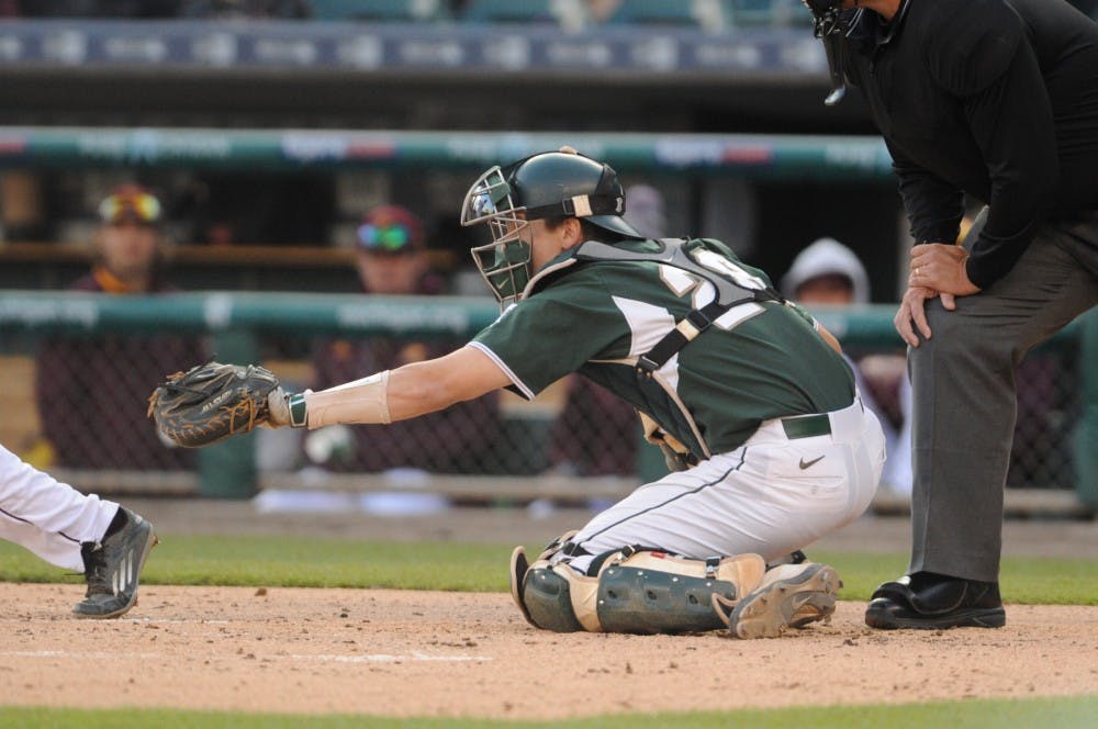 Junior catcher Matt Byars waits for the pitch during the game against Central Michigan on April 14, 2016 at Comerica Park in Detroit. The Spartans defeated the Chippewas, 7-3. 