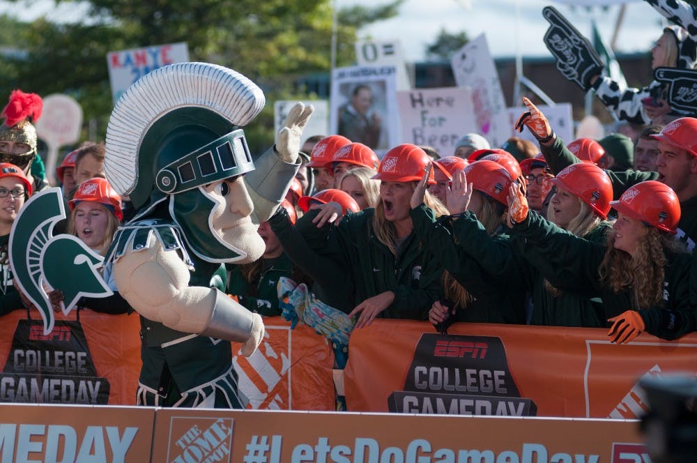 <p>Sparty interacts with fans on Sept. 12, 2015, at ESPN's College Gameday at Munn field. Hundreds of students arrived early in the morning for a chance to see the live taping. Jack Stephan/ The State News</p>