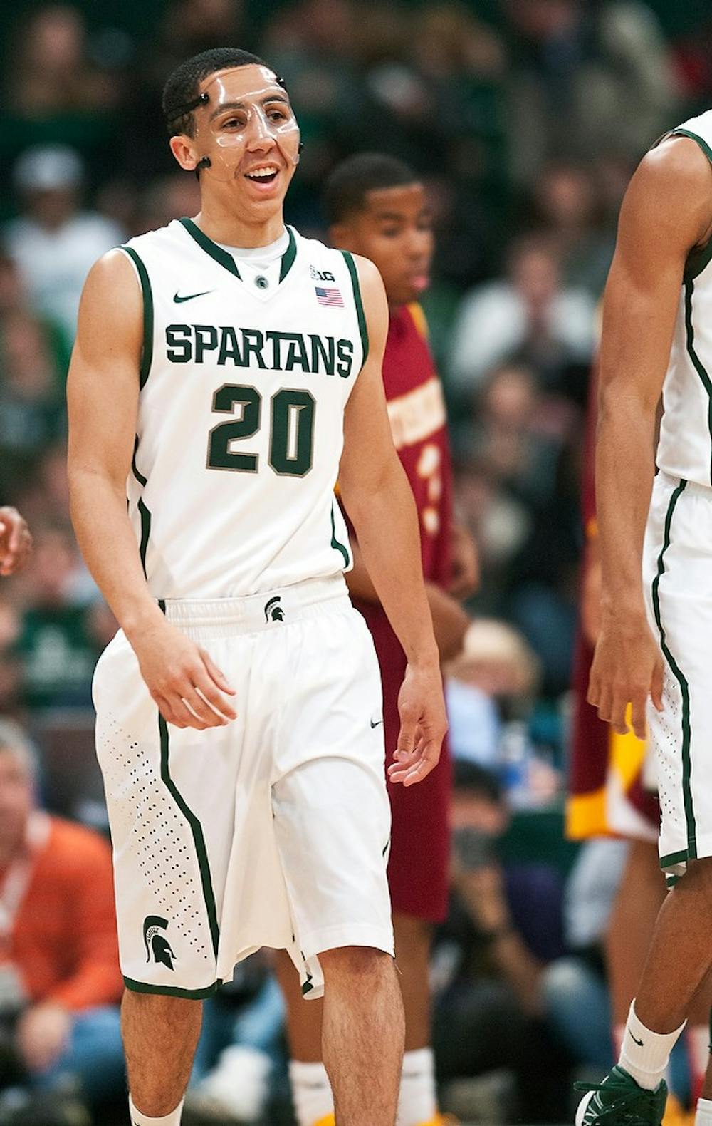 	<p>Sophomore guard Travis Trice smiles while talking with teammates on the court Saturday, Dec. 15, 2012, at Jenison Field House. The Spartans defeated Tuskegee, 92-56. Adam Toolin/The State News</p>