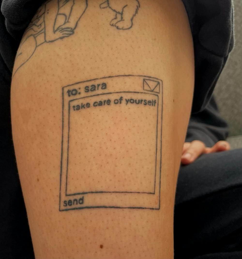 <p>Sara Tidwell&#x27;s right shin, where she has a still-healing tattoo of a quote – &quot;take care of yourself&quot; – in an unsent message box. Art done by Angie Hickey, who works at Old Soul Tattoo Club in Keego Harbor, Mich.</p>