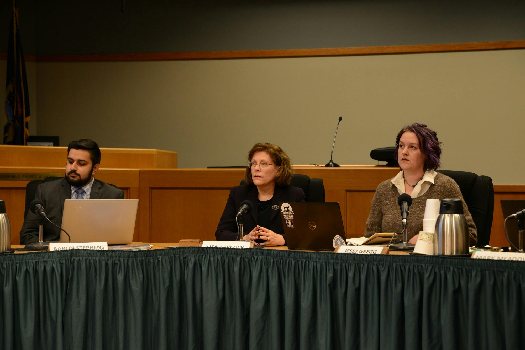 <p>Newly elected city council members including Mayor Pro Tem Aaron Stephens (left), Lisa Babcock and Jessy Gregg during the East Lansing City Council meeting at the East Lansing City Offices on Nov. 12, 2019.</p>