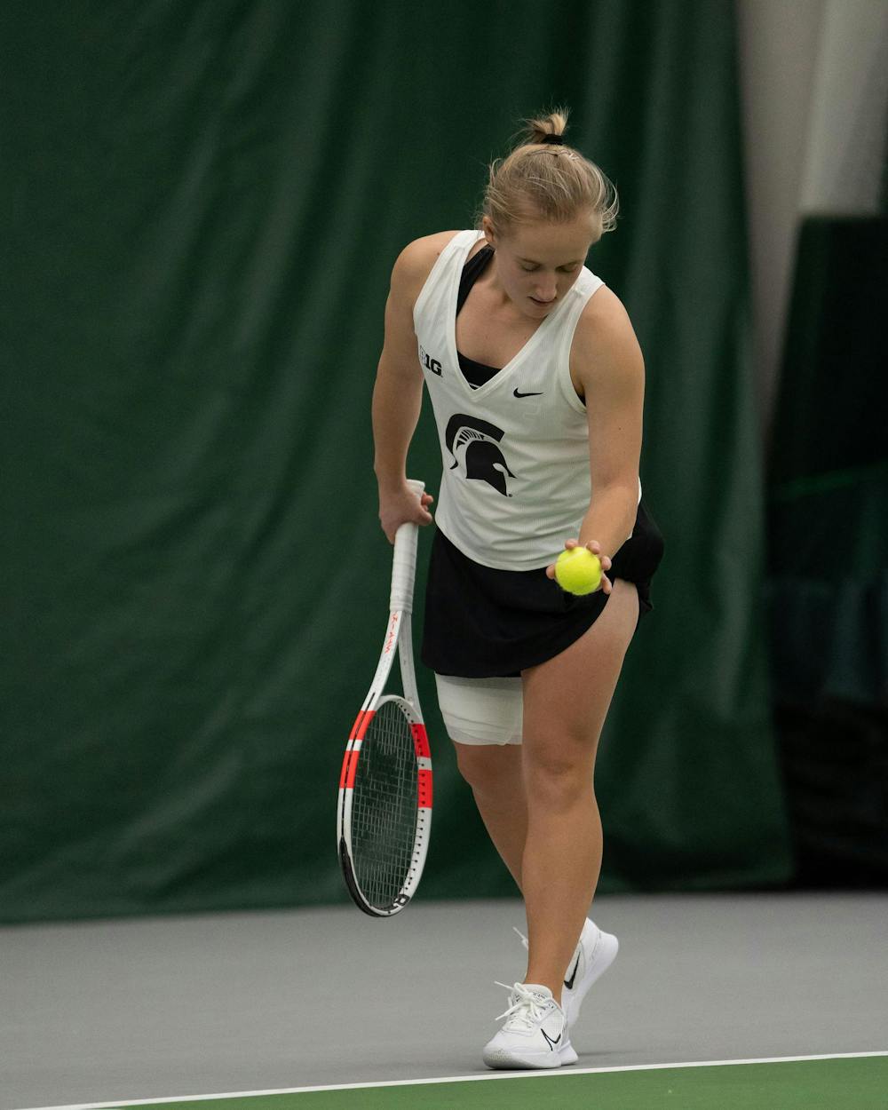 <p>MSU senior Liisa Vehviläinen prepares to serve against Xavier in their doubles match at the MSU Indoor Tennis Center on Jan. 24, 2025. Vehviläinen went on to lose their double match six to three.</p>