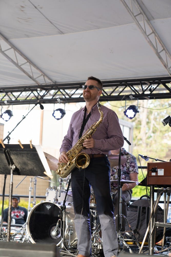 <p>A saxophone musician is performing at the 23rd East Lansing Summer Solstice Jazz Festival on June 21.</p>