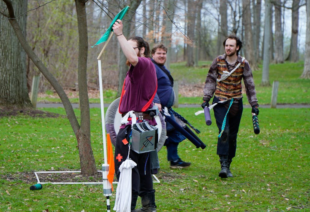 Green team appear to capture a flag at Ashen Hills LARP in Patriache Park, on May 1, 2022.