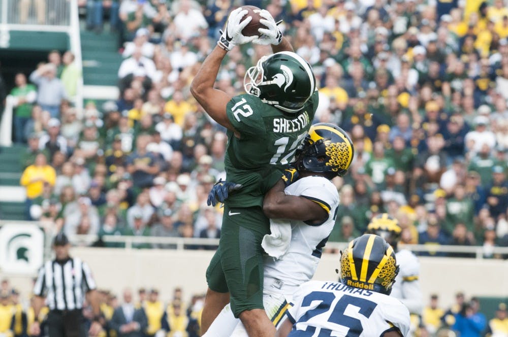 Senior wide receiver R.J. Shelton (12) catches a pass during the game against Michigan on Oct. 29, 2016 at Spartan Stadium. The Spartans were defeated by the Wolverines, 32-23.  