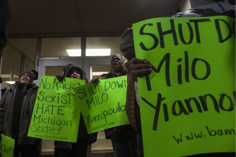 <p>People gather to protest the visit of speaker Milo Yiannopoulos on Dec. 7, 2016 outside Conrad Hall.</p>