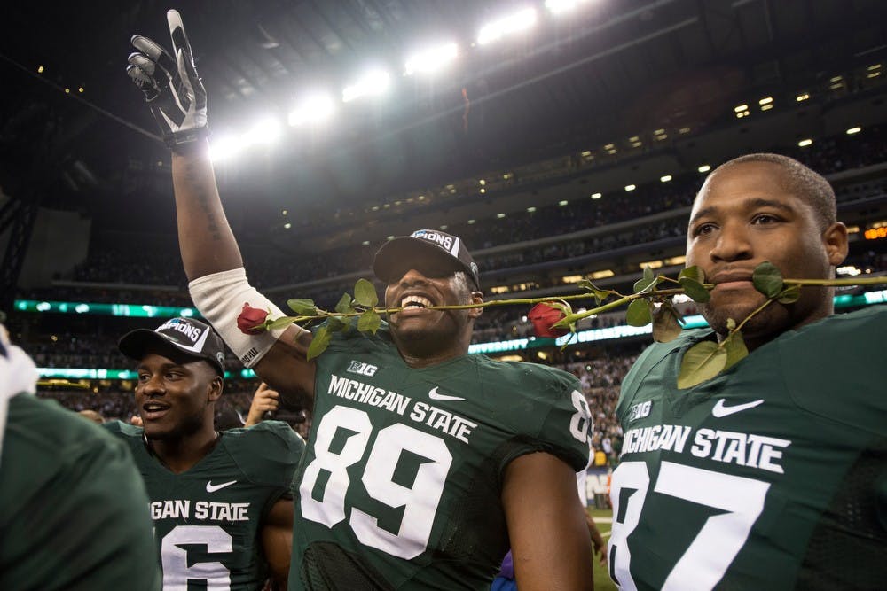 	<p>Sophomore defensive end Shilique Calhoun celebrates the Big Ten Championship win Dec. 7, 2013, at Lucas Oil Stadium in Indianapolis. The Spartans defeated Ohio State, 34-24. Julia Nagy/The State News</p>