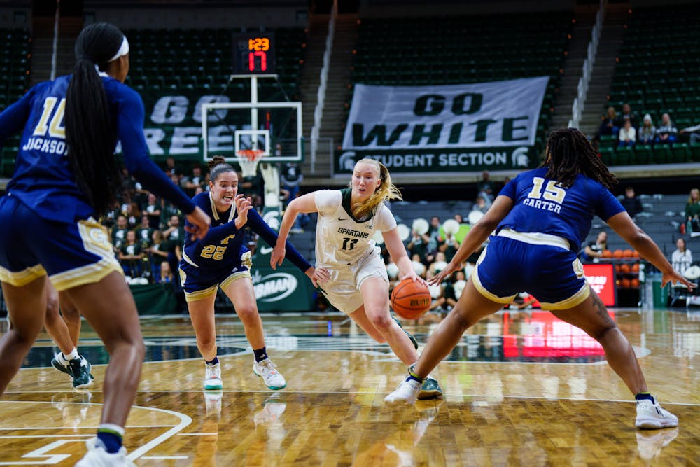 <p>Sophomore guard Matilda Ekh (11) drives toward the basket during a game against Georgia Tech, held at the Breslin Center on Dec. 1, 2022. The Spartans fell to the Yellow Jackets 63-66.</p>