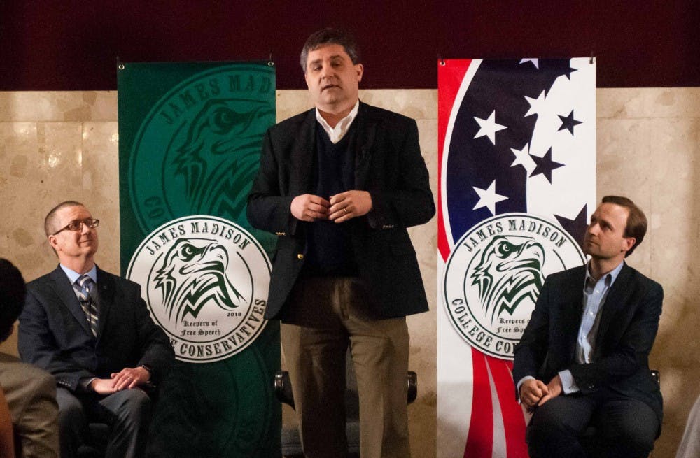 <p>Dr. Jim Hines, left, and Lt. Gov. Brian Calley, right, listen to Sen. Patrick Colbeck, center, during the Michigan Republican Gubernatorial Townhall at the Union on April 3, 2018. (Annie Barker | State News)</p>