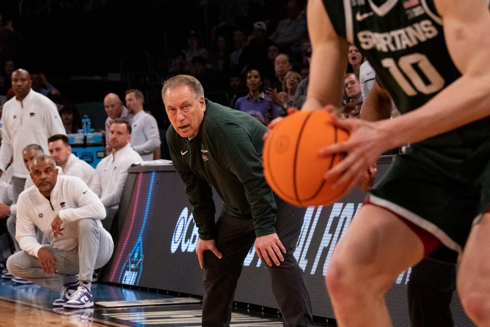 <p>Head men's basketball coach Tom Izzo watches graduate student forward Joey Hauser closely as he attempts a three pointer during the Sweet Sixteen matchup against Kentucky State University at Madison Square Garden on March 23, 2023. The Spartans fell to the Wildcats with a score of 98-93.</p>