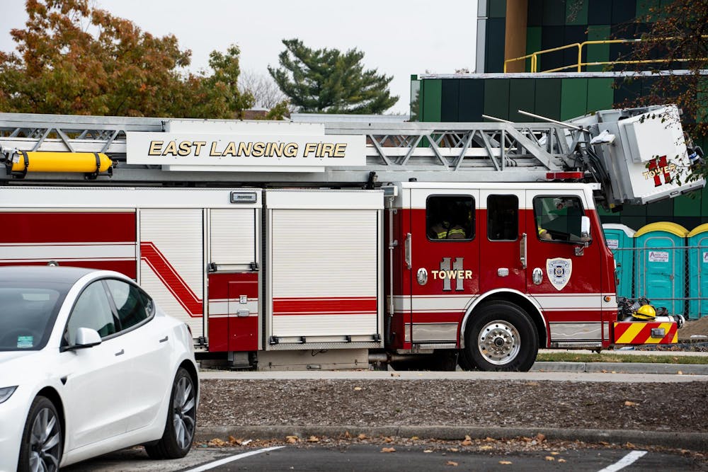 An East Lansing Fire Department vehicle parked on Farm Lane near the construction of the future multicultural center on Oct. 29, 2024. Emergency services cordoned and evacuated the area surrounding the intersection of Farm Lane and N Shaw Lane.