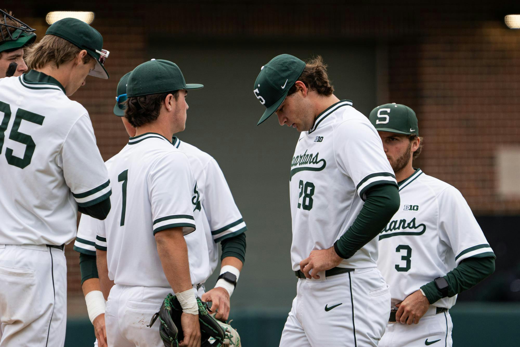 Sophomore RHP Aidan Donovan consults with his teammates on the mound before returning to action against Maryland at Jeff Ishbia Field at McLane Stadium in East Lansing, Michigan on April 25, 2026.

