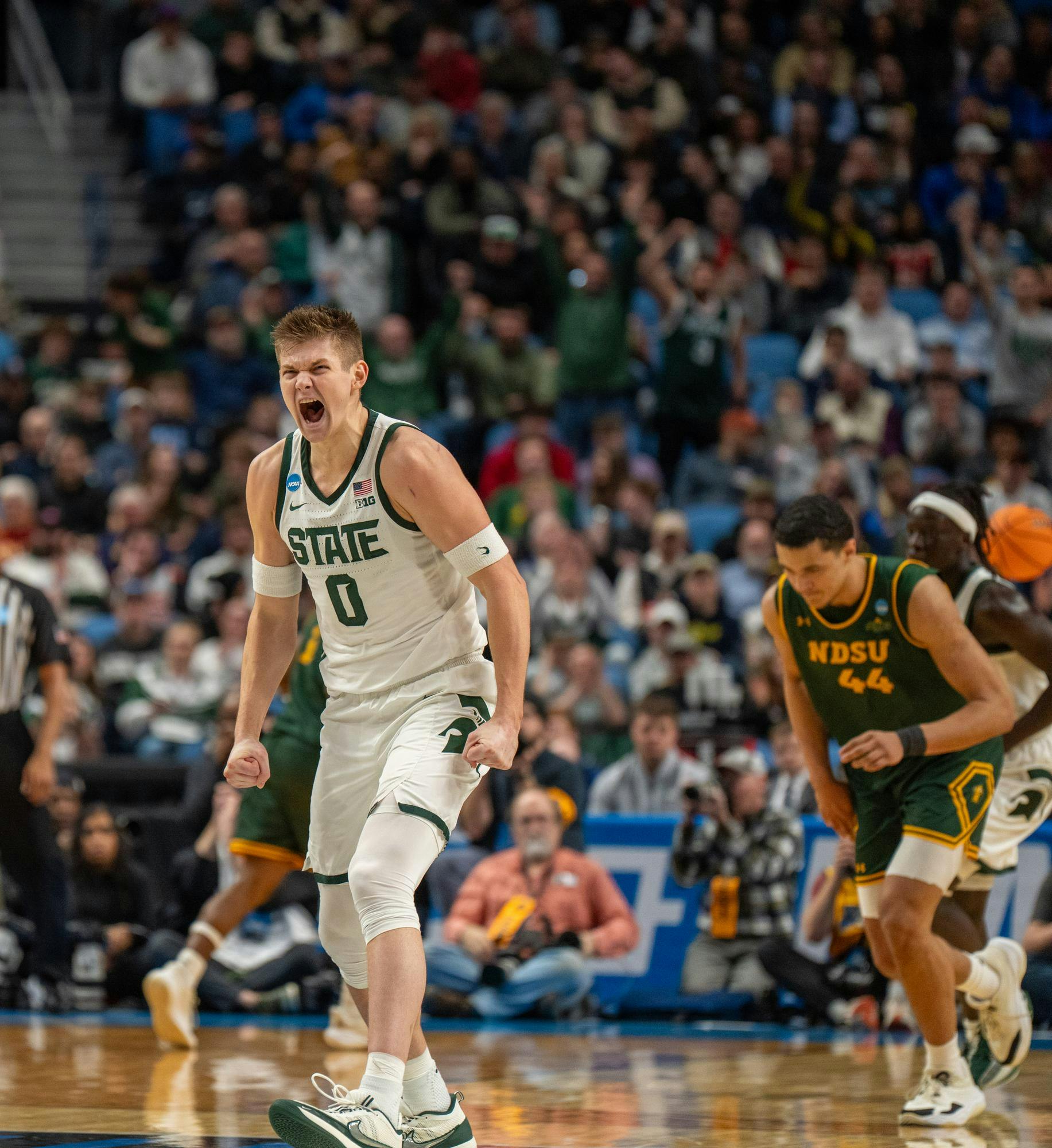 Senior forward Jaxon Kohler (0) celebrates a basket during the March Madness matchup against North Dakota State at the KeyBank Center in Buffalo, New York on March 19, 2026.