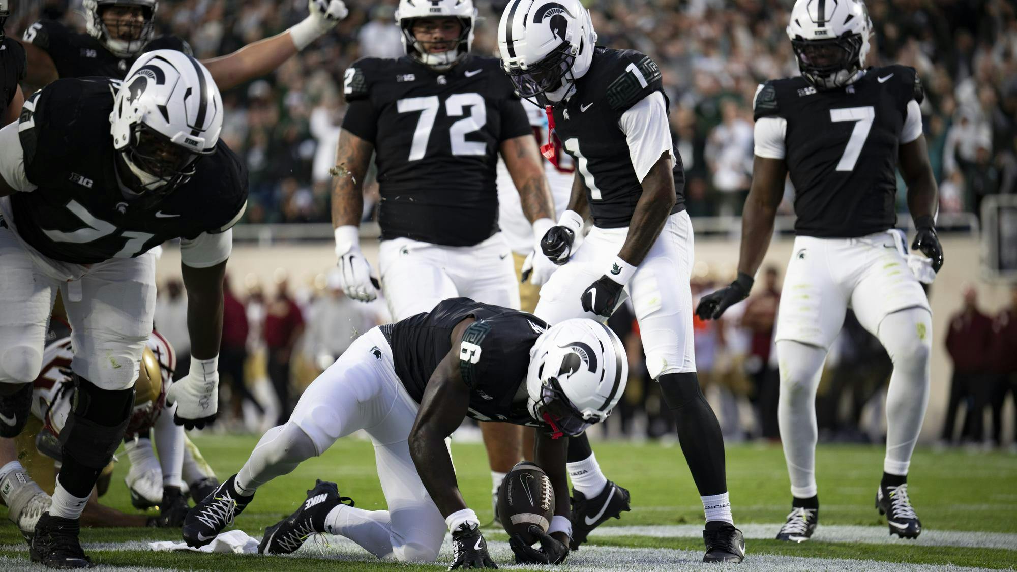<p>MSU wide receiver sophomore Nick Marsh (6) scores the first touchdown of the game against the Boston College Eagles at Spartan Stadium in East Lansing, Michigan, on Sept. 6, 2025.</p>
