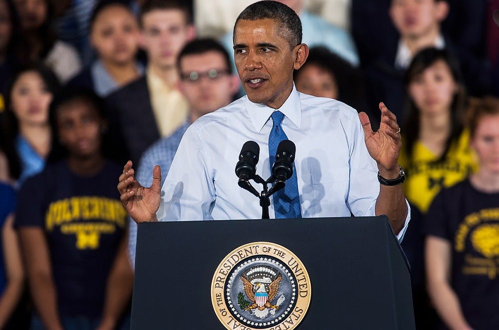 <p>President Barack Obama gives his speech April 2, 2014, at the Intramural Sports Building at the University of Michigan in Ann Arbor. President Obama spoke to the crowd about his goal to raise the federal minimum wage to $10.10. Erin Hampton/The State News</p>
