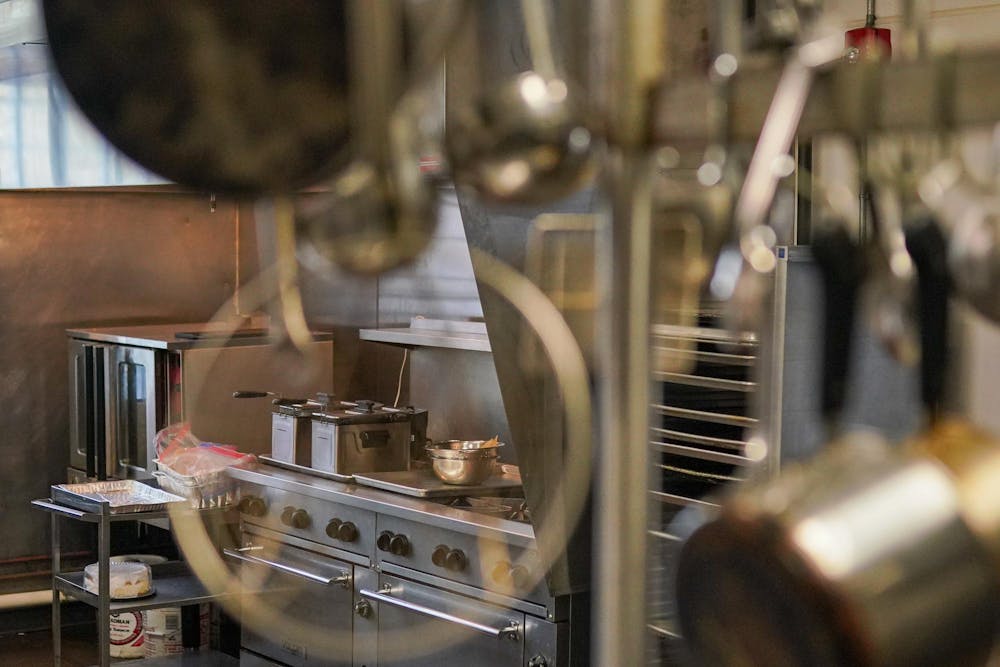 <p>Deep fryers that were used to make egg rolls earlier in the day at the Incubator Kitchen inside of the Allen Neighborhood Center on Nov. 1, 2023.</p>