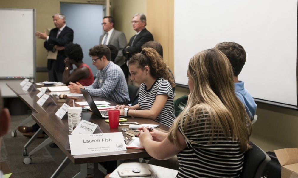 <p>Guest speakers talk about different services available to MSU students during an ASMSU meeting on Aug. 27, 2017 at Student Services. They encourage the general assembly to talk to their peers about such services.</p>