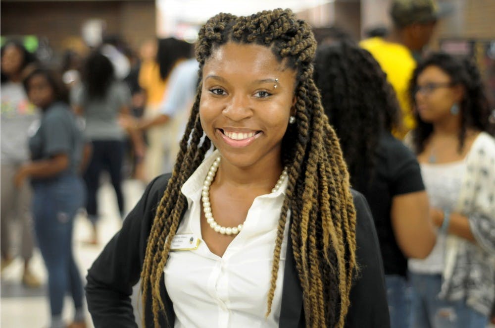 <p>Finance senior and president of the Black Student Alliance, Myya Jones, poses for a picture on Sept. 5, 2015 at the Business College Complex.</p>