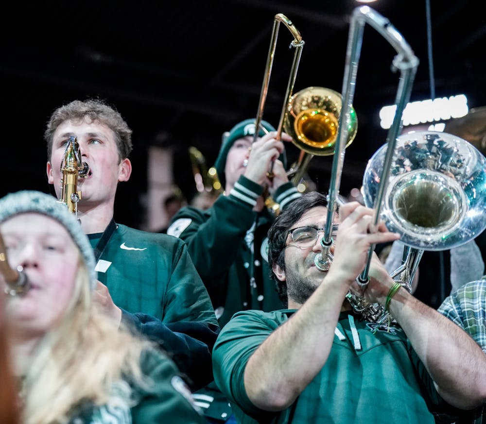 <p>The Spartan Band plays during a men's hockey game against Notre Dame at Munn Ice Arena on Feb. 3, 2023. The Spartans defeated the Fighting Irish 3-0.</p>