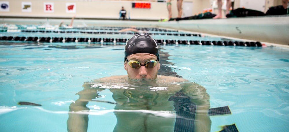 <p>Finance sophomore Guy Moskovich poses for a portrait on Feb. 5, 2019 at the MSU Swimming and Diving facility at IM-Sports West.</p>