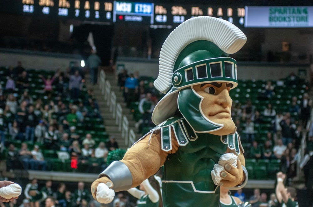 <p>Sparty throws T-shirts into the crowd during the game against East Tennessee State Nov. 11, 2018 at Breslin Center. The Spartans lead the Buccaneers at halftime, 32-29.</p>