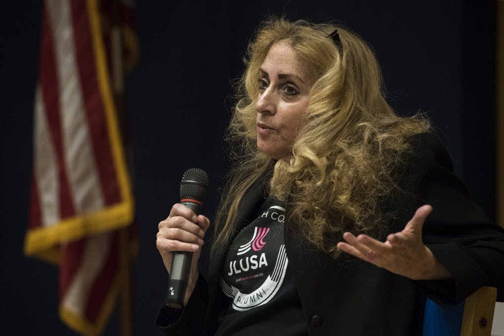 Monica Jahner of Lansing shares her story during the Clean Slate community listening session at the Michigan History Center in Lansing on Feb. 12, 2019. Nic Antaya/The State News