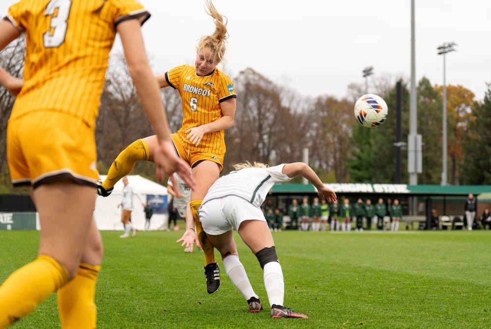 <p>Western Michigan University senior midfielder Brooke Bailey (6) and Michigan State University senior forward Jordyn Wickes (12) fight for the ball during the NCAA soccer tournament between MSU and WMU on Nov. 16, 2024. The Spartans defeated the Broncos, 3-1.</p>