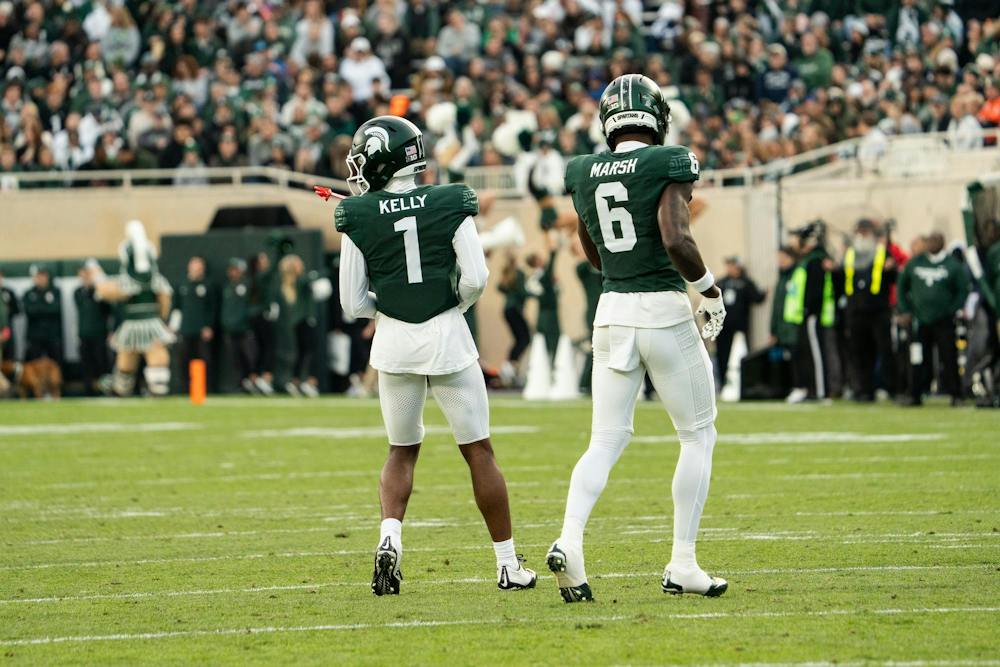 <p>Wide receiver Omari Kelly (1) and fellow wideout Nick Marsh (6) jog downfield during Michigan State’s game at Spartan Stadium in East Lansing, Mich., on Saturday, Nov. 15, 2025.</p>