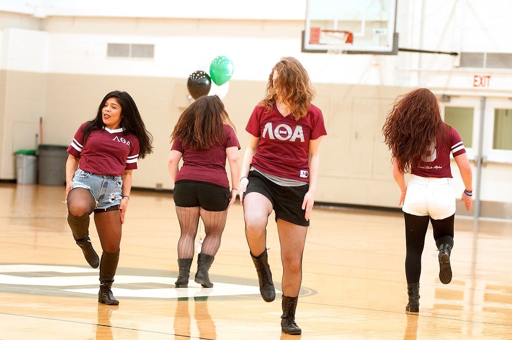 <p>Lambda Theta Alpha Latin Sorority, Inc. sisters dance March 27, 2015, during the Multicultural Greek Showcase at IM West. The girls performed to commemorate their founders and the tradition of their sorority. Kennedy Thatch/The State News</p>