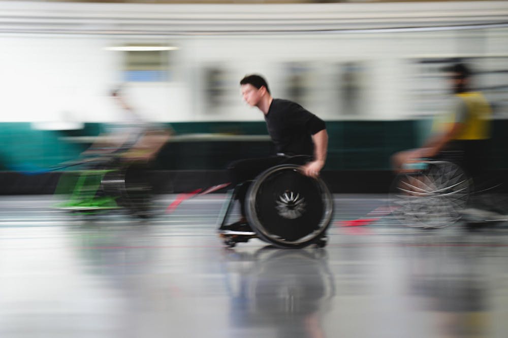 A participant rolls their wheelchair at Demonstration Hall in East Lansing, MI on Feb. 8, 2026
