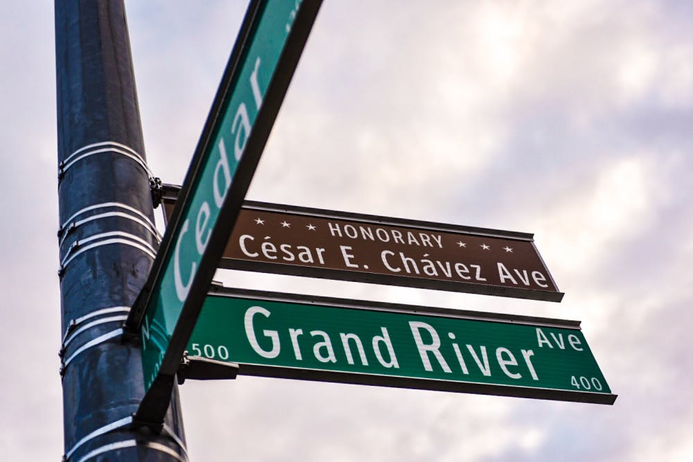 Recent protest against the Lansing City Council have resulted to change in 'Honorary Cesar E. Chavez Ave.' to 'Cesar E. Chavez Ave.', pictured on Oct. 30, 2017 at East Grand River Ave. and North Cedar St. 