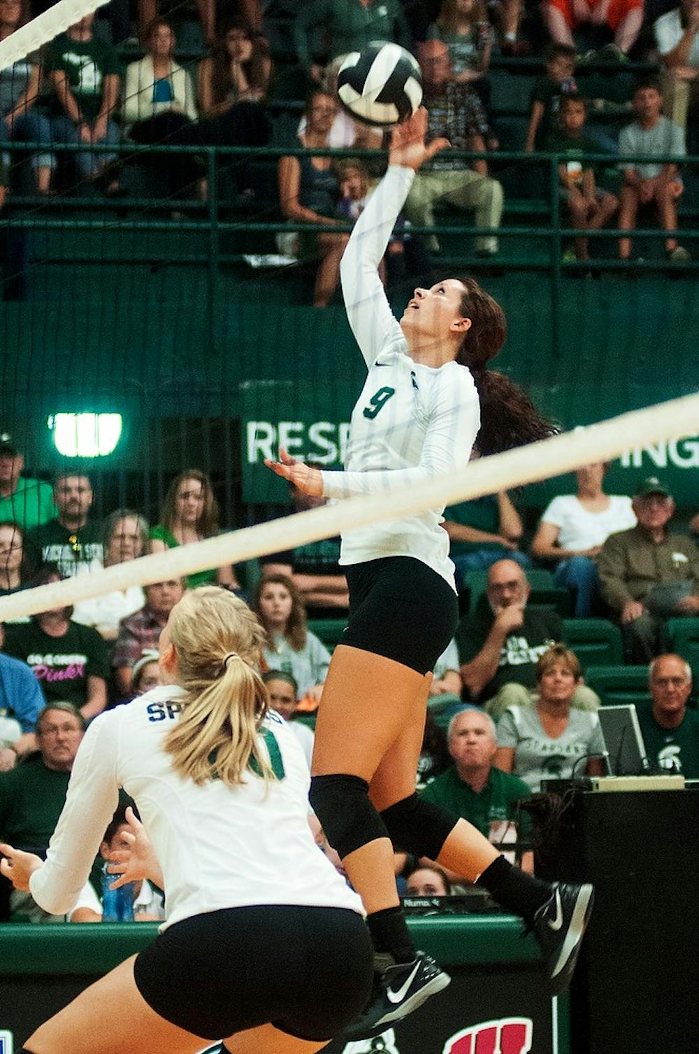 	<p>Junior outsider hitter Taylor Galloway jumps up to hit the ball during the game against Oregon, Sept. 6, 2013, at Jenison Field House. The Spartans defeated Oregon, 3-1. Danyelle Morrow/The State News</p>