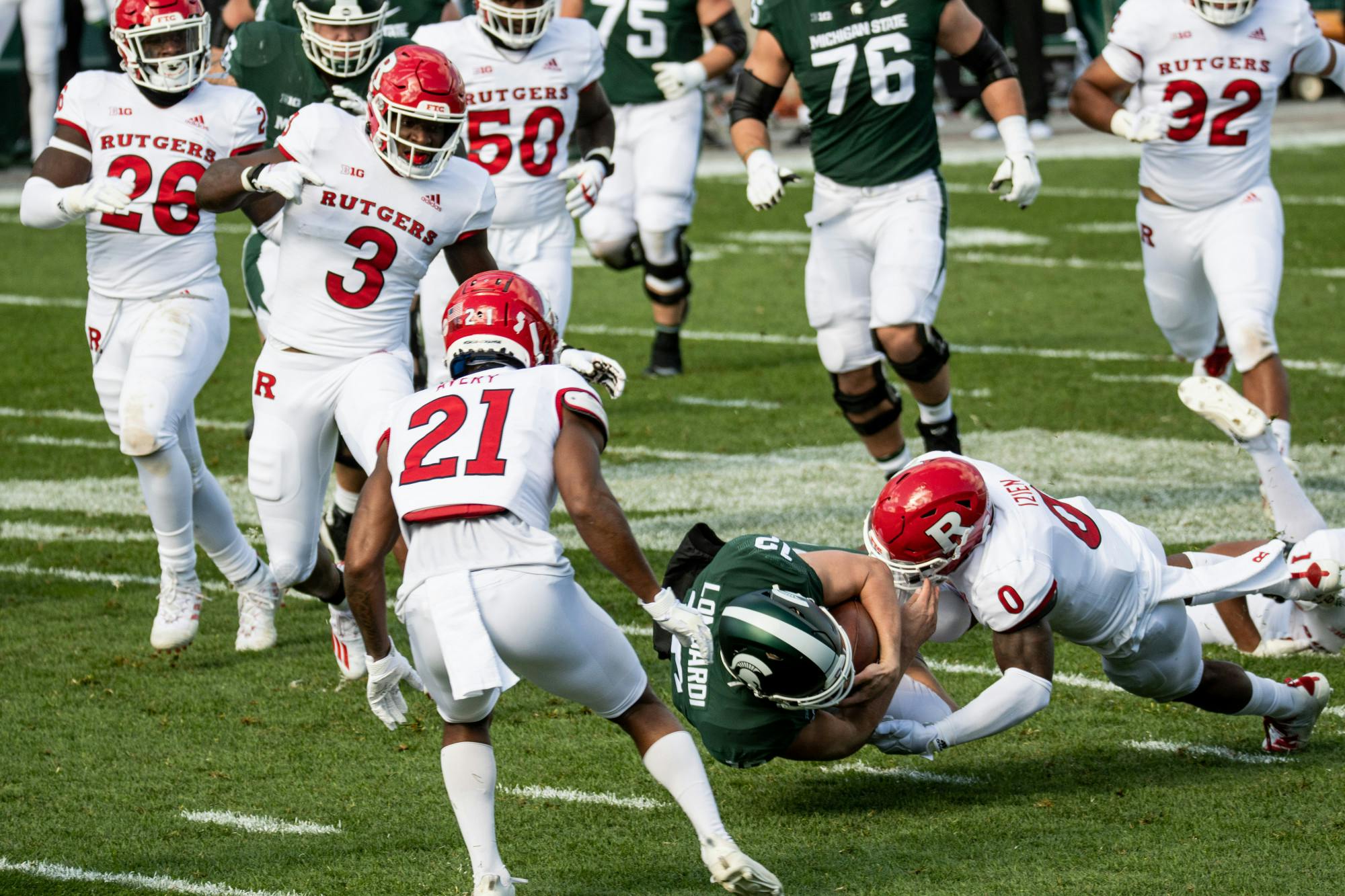 <p>Former quarterback Rocky Lombardi gets tackled in a game against Rutgers on Oct. 24, 2020.</p>
