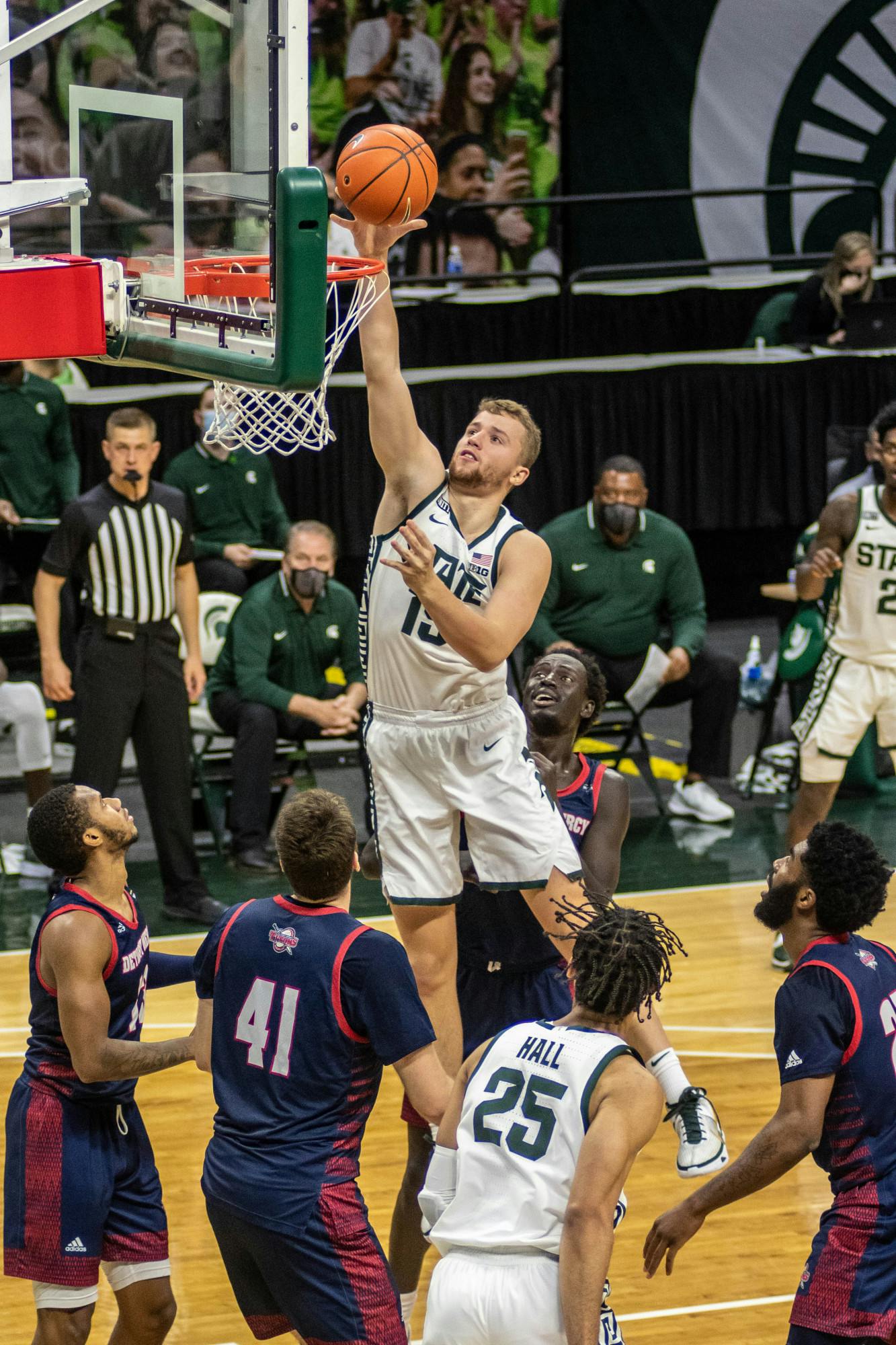 Junior forward Thomas Kithier (15) shoots the ball during the game against the Detroit Titans on Dec. 4, 2020 at the Breslin Center. The Spartans defeated the Titans, 83-76.