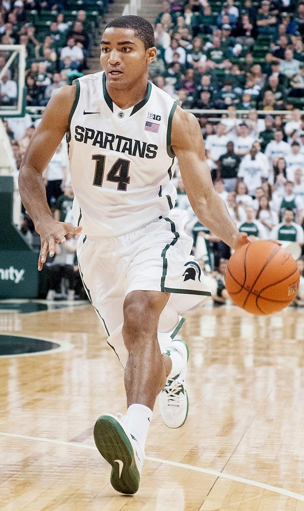 	<p>Freshman guard Gary Harris dribbles the ball down the court during the game against Texas Southern on Sunday at Breslin Center. Harris scored 19 points for the Spartans, helping them beat the Tigers 69-41. Natalie Kolb/The State News</p>