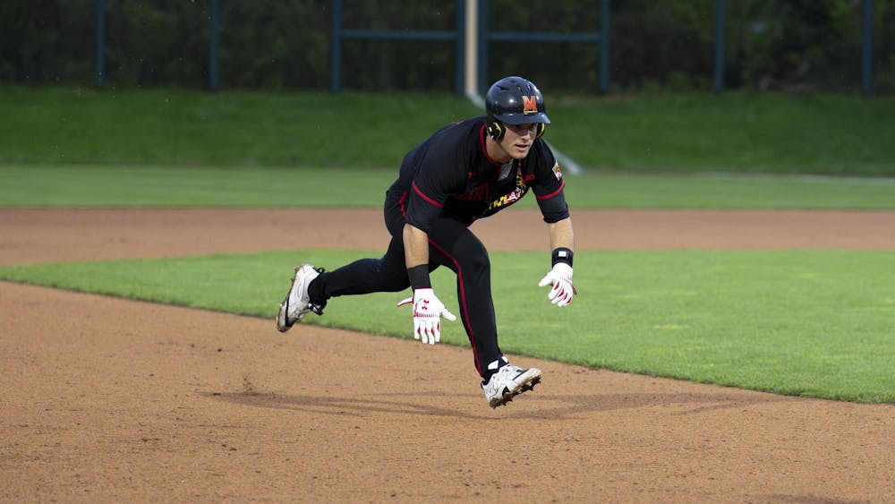 <p>Maryland redshirt junior Devin Russell runs toward third base at Jeff Ishbia Field at McLane Baseball Stadium in East Lansing, Mich., on Friday, April 24, 2026. </p>