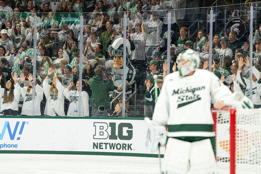 Sparty hypes up the crowd between the action at Munn Ice Arena on Saturday, Oct. 7, 2023. MSU beat Lake Superior State University 5-2 in the early evening matchup.