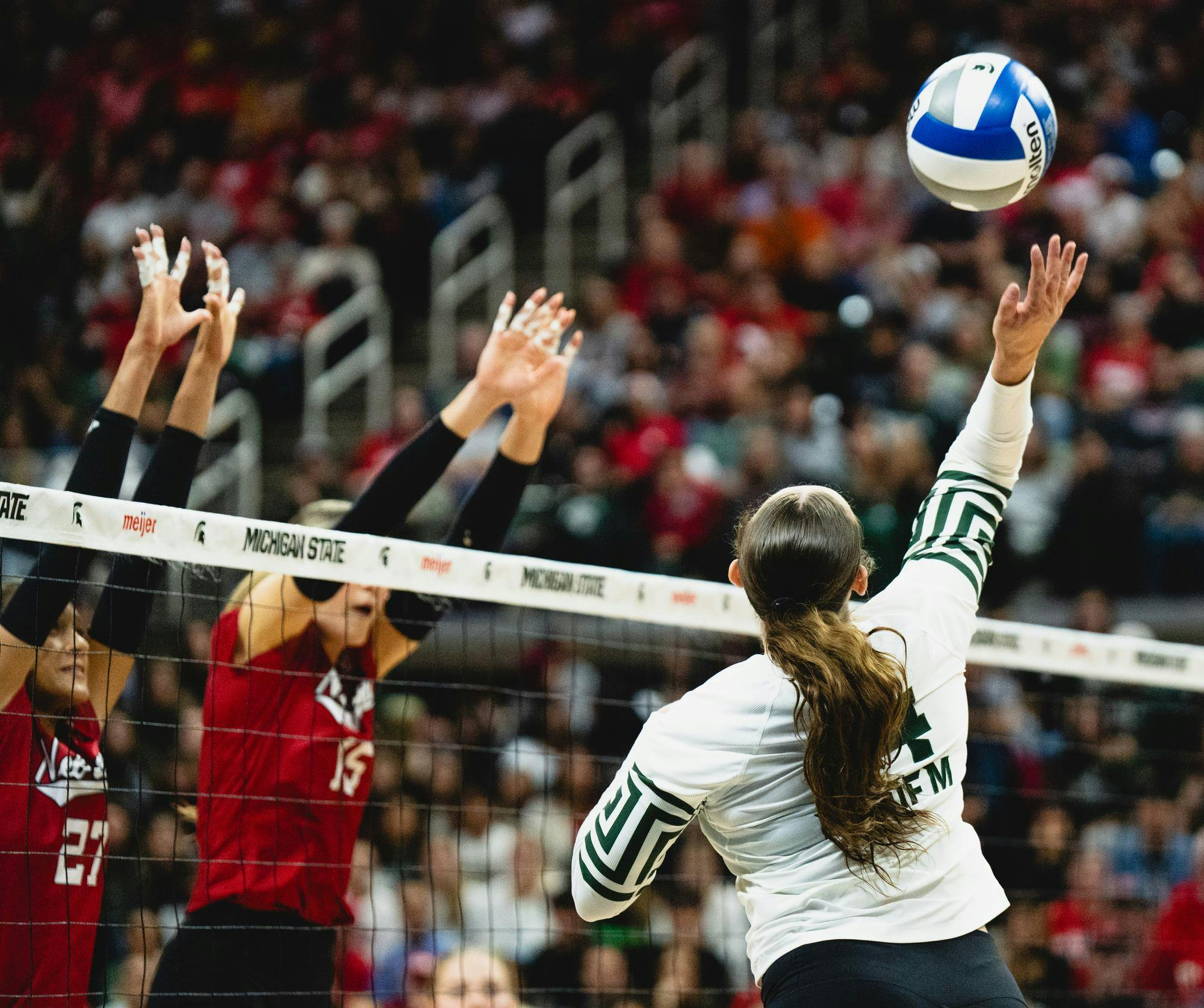 <p>Michigan State outside hitter Danyle Courtley (4) hits the ball towards Nebraska at the Breslin Center in East Lansing, MI on Oct. 18, 2025.</p>