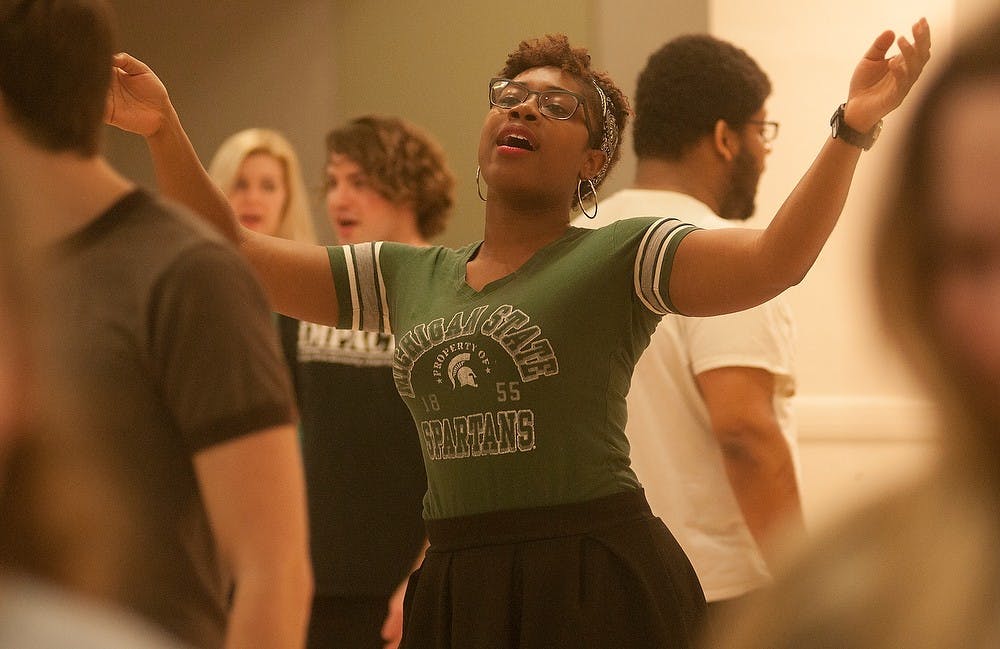 <p>Theatre and interdisciplinary social science senior Jenise Cook rehearses Mar. 17, 2015, at the Auditorium, 542 Auditorium Rd. "Hair" will be performed at the Wharton Center April 17-26. Alice Kole/The State News </p>