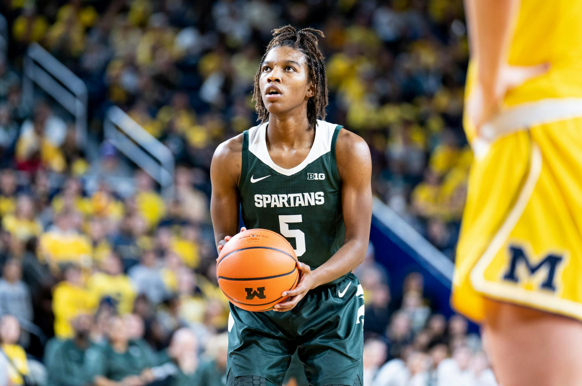 <p>Graduate student guard Kamaria McDaniel (5) is about to shoot a free throw during a game against Michigan at the Crisler Center on Jan. 14, 2023. The Spartans lost to the Wolverines 70-55. </p>