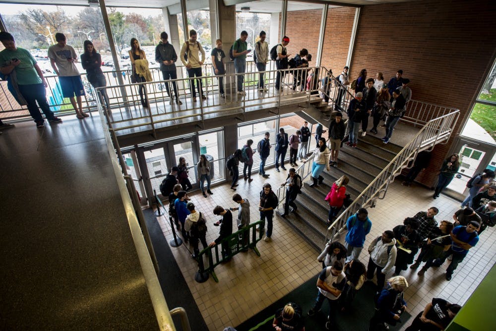 People wait in line to vote on Nov. 8, 2016 at IM West. 