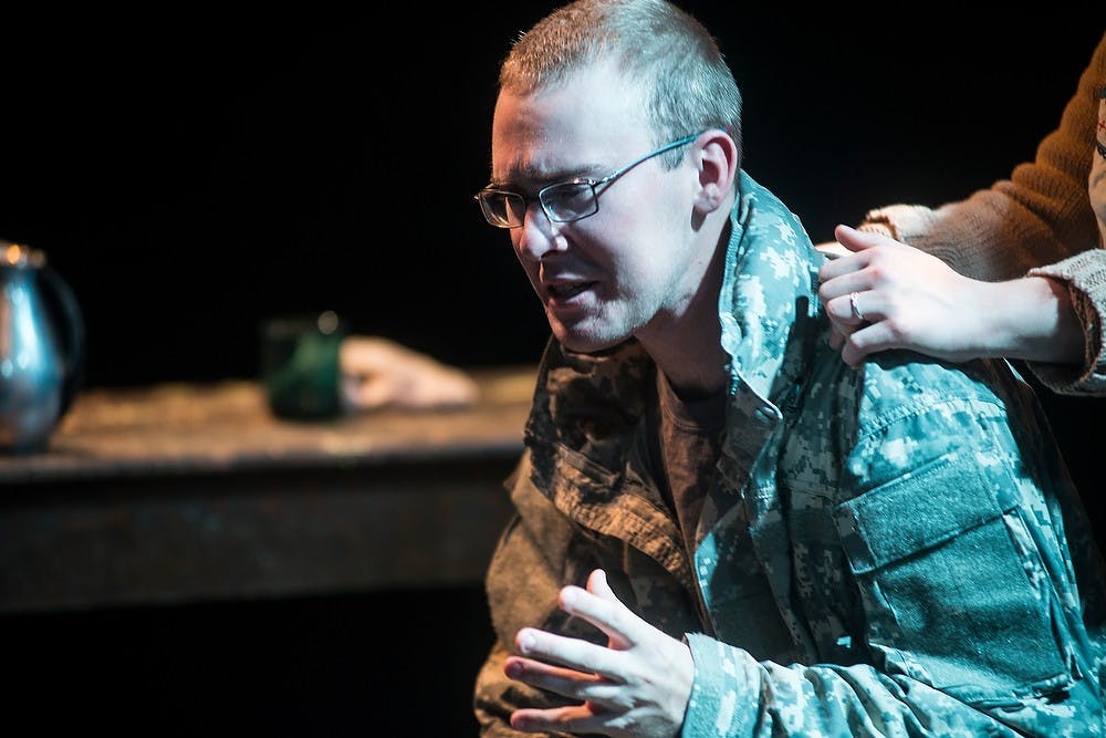 <p>Political science and theater junior Jeff Jaeger, who plays the role of Greenville, acts on stage with theater junior Bonnie Bairley Oct. 1, 2014, during a scene in the Arena Theater at the MSU Auditorium. There will be a show Friday, Oct. 3 at 8 p.m. and a how Sunday, Oct. 5, at 2 p.m. Admission is $5 at the door. Erin Hampton/The State News</p>