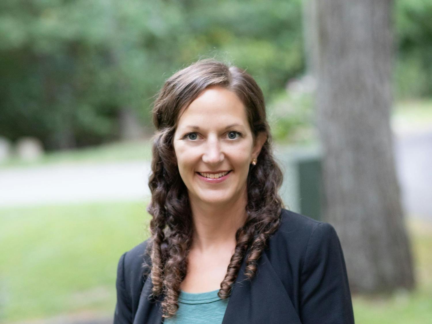 Rebecca Corke Headshot Square Low Res IMG_9157-1 square.jpg