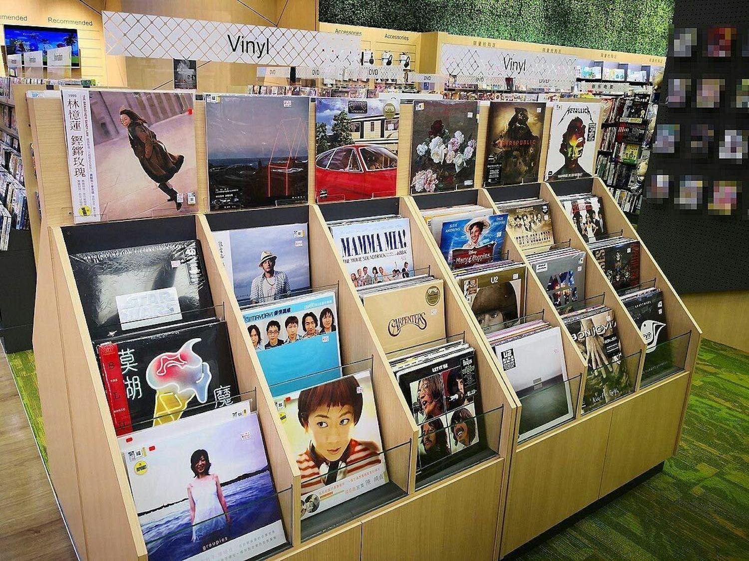 Vinyl collections displayed in a music store are pictured.