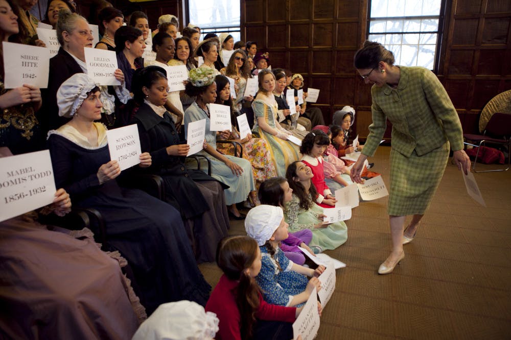 Award-winning screenplay writer Jennifer Burton gets into character as "Rachel Carlson" and joins the cast of characters as she directs "Half the History" inside the Crane Room at Tufts University.