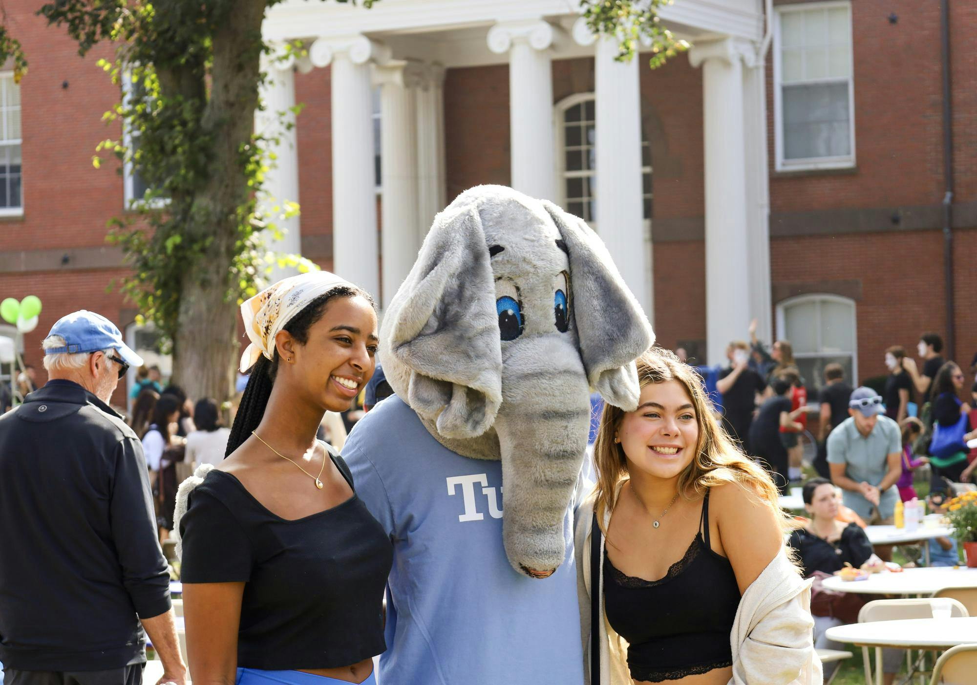 Jumbo is pictured with community members on the academic quad at Tufts Community day on Oct. 1.