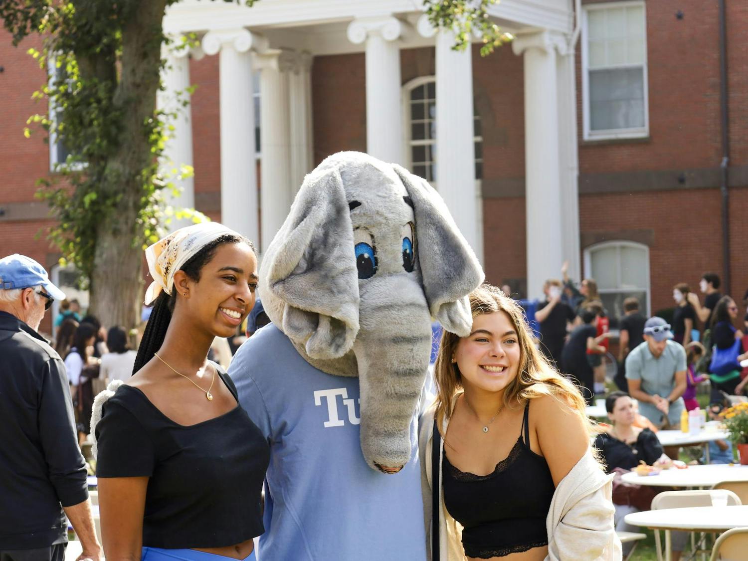 Jumbo is pictured with community members on the academic quad at Tufts Community day on Oct. 1.