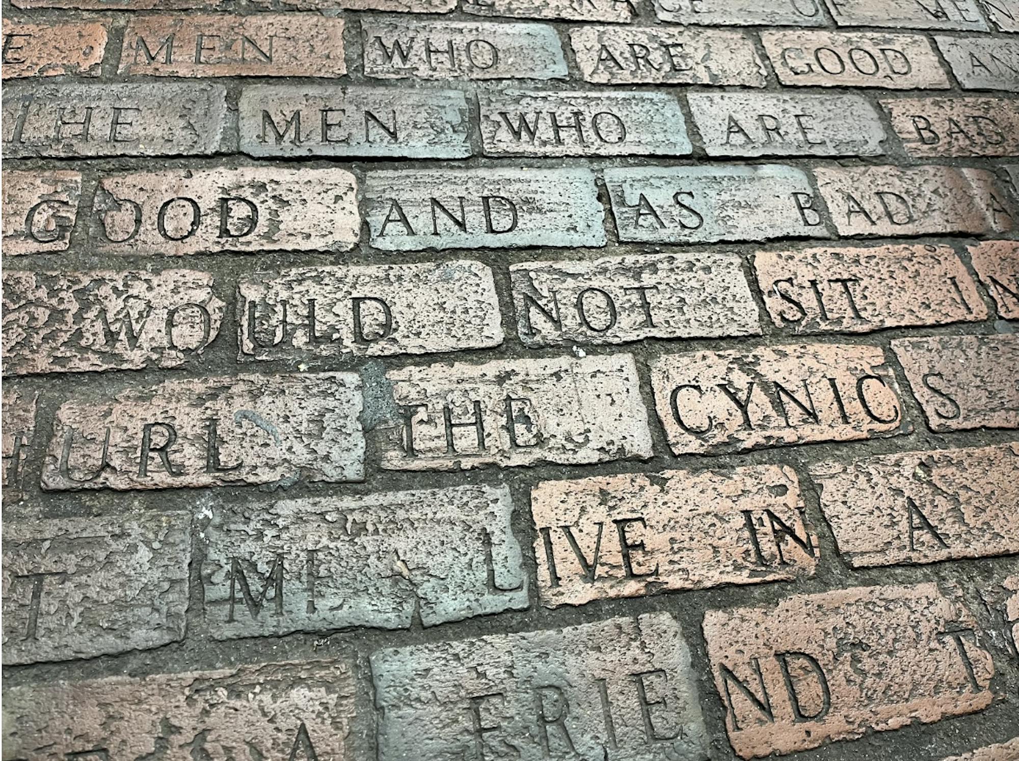 "The House by the Side of the Road" by Sam Walter Foss is pictured at the Davis Square station.